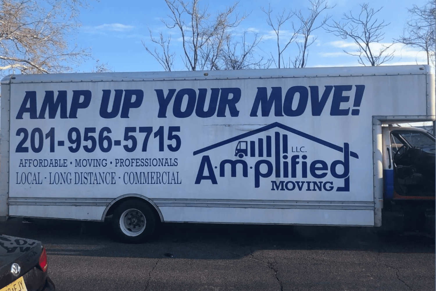 lateral view of an amplified moving labeled semi truck